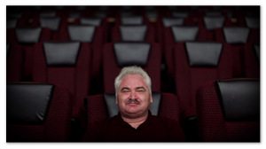 Jay Forry sitting in a movie theater Jay Forry sitting in a movie theater