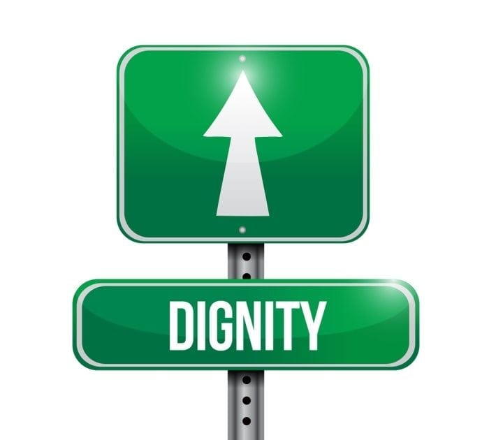 Image showing a green street sign with the word "dignity" displayed and an arrow pointing forward. Image showing a green street sign with the word "dignity" displayed and an arrow pointing forward.