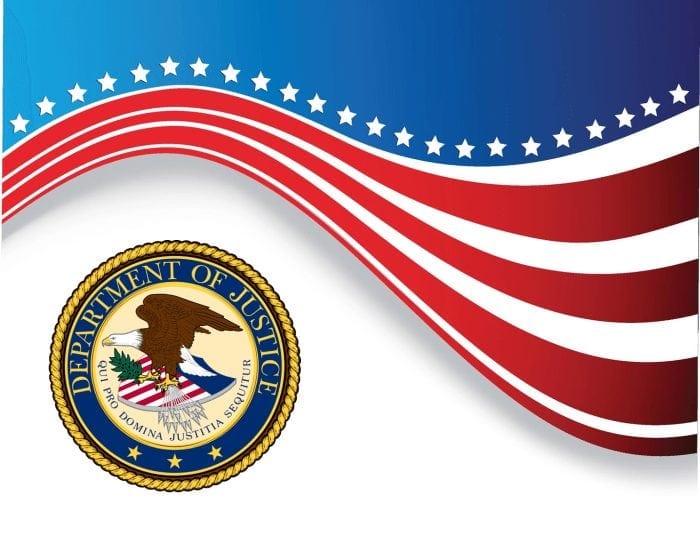Official Department of Justice seal with an American flag graphic above